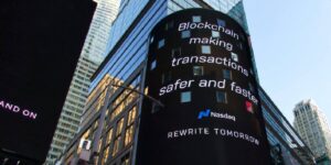 Nasdaq billboard highlighting blockchain's impact on secure and speedy transactions.