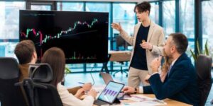 Business Team Analyzing Cryptocurrency Market Trends in a Conference Room
