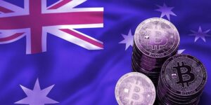 Stacks of Bitcoin coins against an Australian flag background.