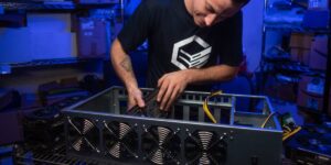 A crypto miner assembling a GPU mining rig, carefully installing graphics cards in a high-performance mining setup.