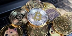 bitcoin and various altcoins including Binance, Ethereum, Dogecoin and more on a keyboard