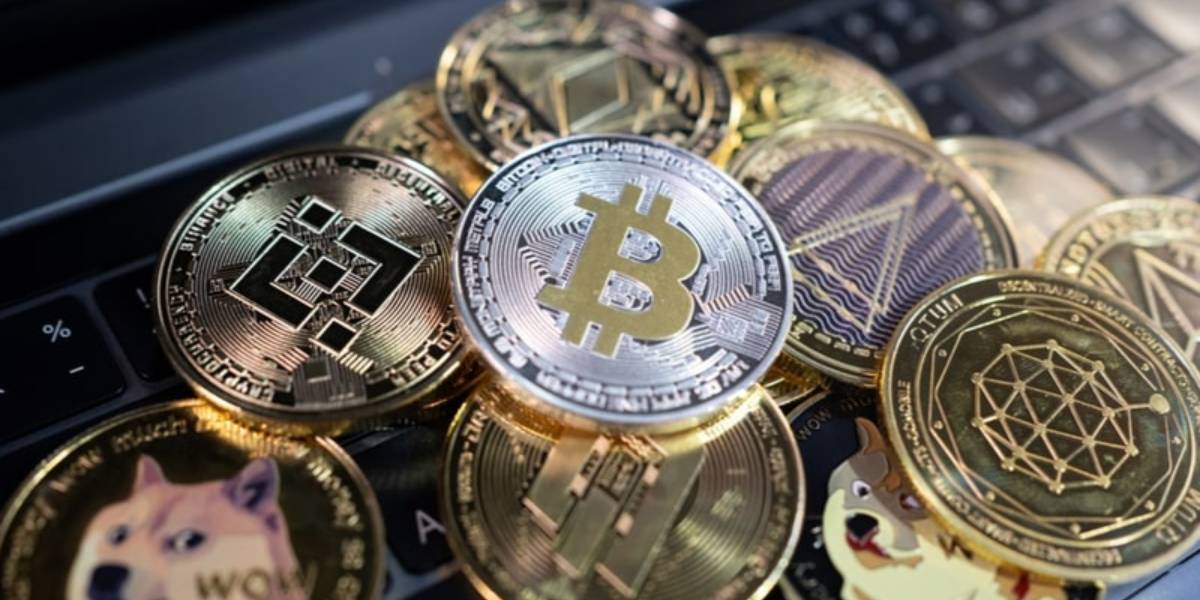 bitcoin and various altcoins including Binance, Ethereum, Dogecoin and more on a keyboard