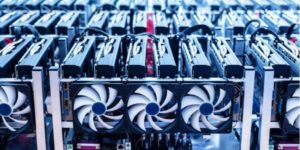 Close-up view of multiple ASIC mining rigs with cooling fans in operation.