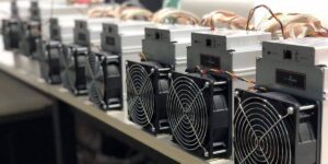 Bitmain Antminer S21 Pro mining rigs arranged in a row for cryptocurrency mining operations.
